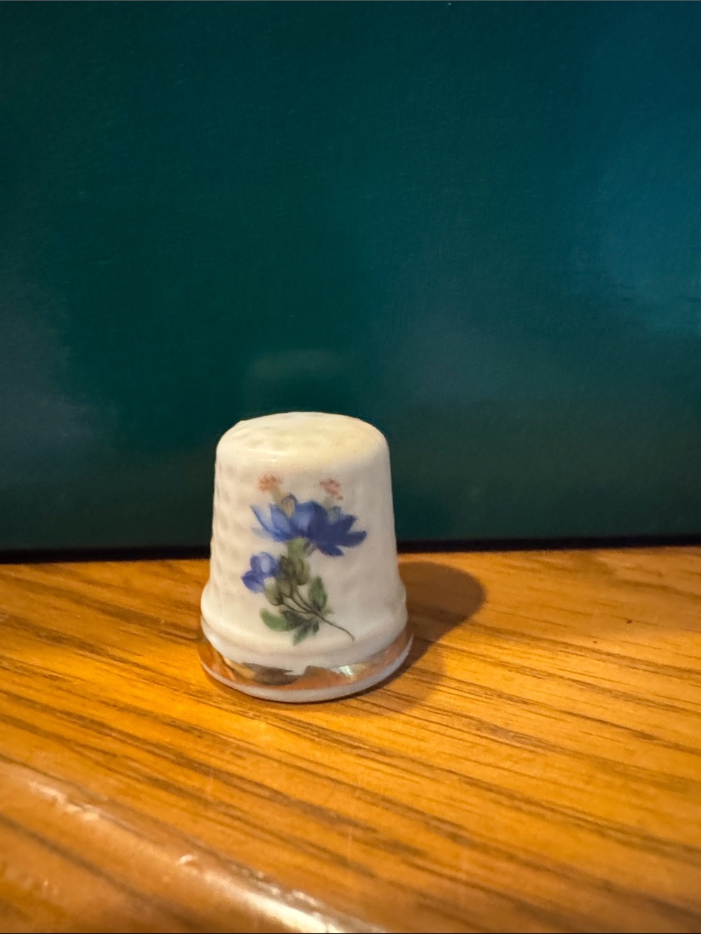 White Porcelain Decorative Thimble with Blue Floral Motif